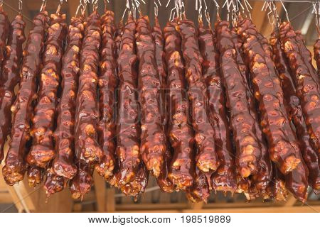 Brown sweet churchchel. Oriental sweets in the bazaar