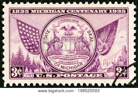 USA - CIRCA 1935: A stamp printed in USA issued for the Michigan Centenary shows Seal of Michigan, circa 1935.