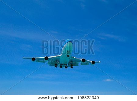 A 747 jumbojet landing in an airport