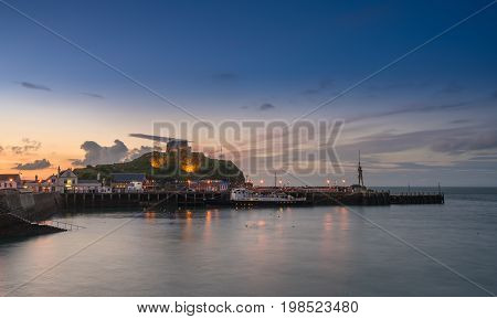 Panorama of the seaside town of Ilfracombe in Devon at sunset with view over harbor and houses