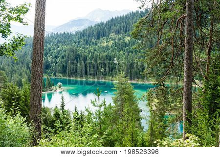 Caumasee in Switzerland lake with turquoise water for hiking and swimming