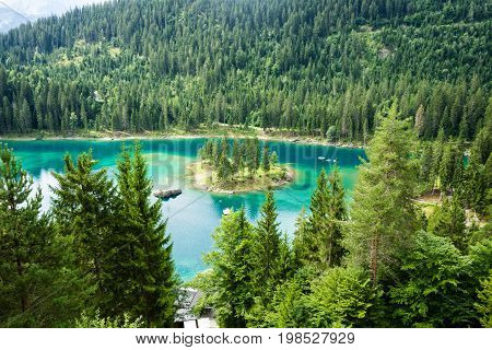 Caumasee in Switzerland lake with turquoise water for hiking and swimming