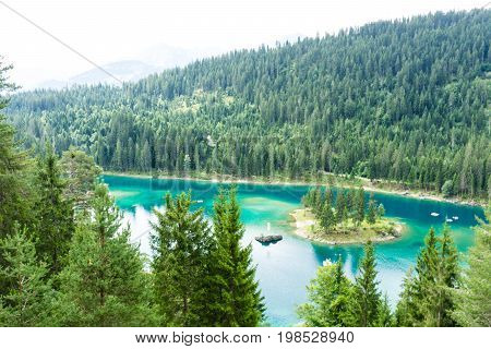 Caumasee in Switzerland lake with turquoise water for hiking and swimming