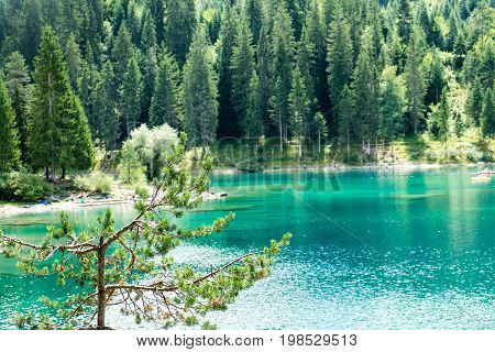 Caumasee in Switzerland lake with turquoise water for hiking and swimming