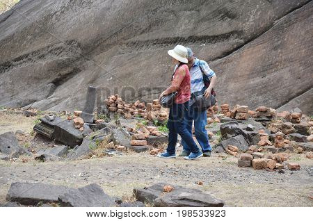 Senior Travelers Lovers Walking And Visit Vat Phou Or Wat Phu