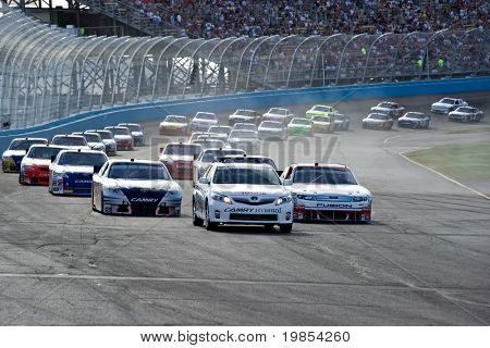 AVONDALE, AZ - APRIL 10: The pace car leads a group of cars out of turn two at the Subway Fresh Fit 600 NASCAR Sprint Cup race on April 10, 2010 in Avondale, AZ.
