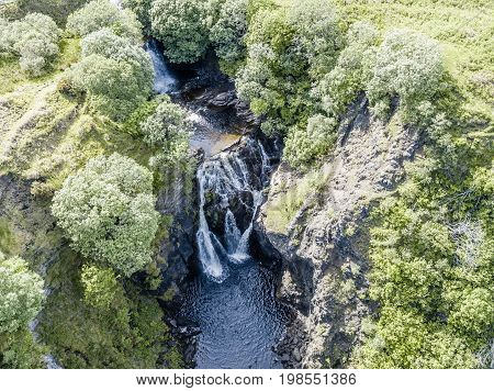 Aerial of the beautiful Lealt Falls - Isle of Skye - Scotland, United Kingdome