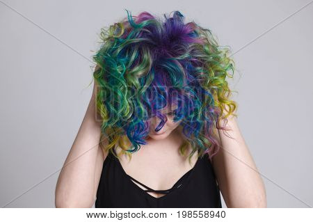Colored hairs. Portrait of beautiful women with flying hairs and rhinestones . Ombre. Gradient. Copy-space. Shahtoosh