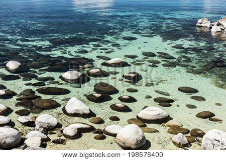 Beautiful boulders and crystal clear water of the lake Tahoe. Hidden Beach, Lake Tahoe - Nevada, USA