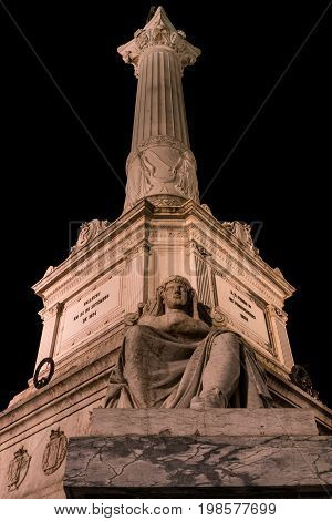 Column of Pedro IV on Rossio Square, Pedro IV Square, Praca de D. Pedro IV in the city of Lisbon at night, in Portugal