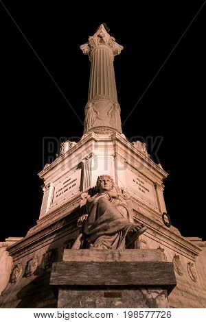 Column of Pedro IV on Rossio Square, Pedro IV Square, Praca de D. Pedro IV in the city of Lisbon at night, in Portugal