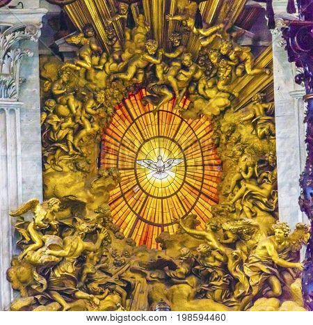 ROME, ITALY - JANUARY 18, 2017 Throne Bernini Holy Spirit Dove Saint Peter's Basilica Vatican Rome Italy. Bernini created Saint Peter's Throne with Holy Spirti Dove Stained Glass Amber in 1600s