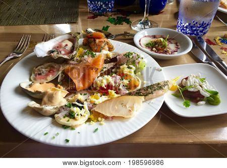 Artistic Seafood Platter: Salmon, Caviar and Shellfish.