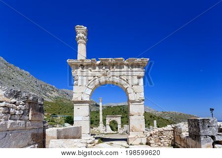 Ancient city Sagalassos ruins columns, sculpture and big stones
