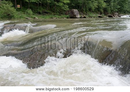 Against The Background Of The Wood The Quiet River The Bottom View Plivt