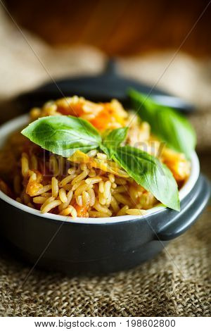 Pilaf with beef, carrots, onions, garlic, pepper and cumin. A traditional dish of Asian cuisine.