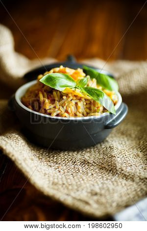 Pilaf with beef, carrots, onions, garlic, pepper and cumin. A traditional dish of Asian cuisine.