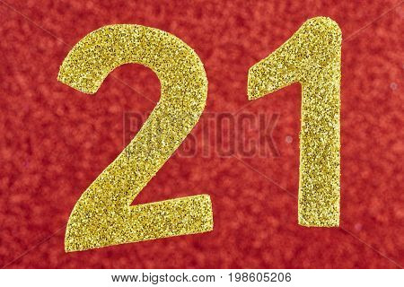 Number twenty-one golden over a red background. Anniversary. Horizontal