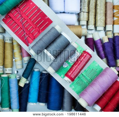 Sewing thread coils needles and needle threader