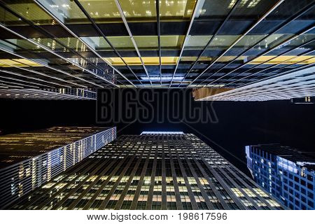 High Skyscrapers Near Timesquare At Night In Manhattan