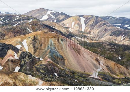 View on the beautifully colored mountain, volcano Blahnukur, Iceland.