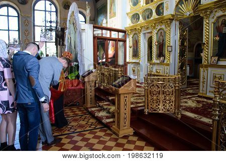 Alchevsk, Ukraine - April 28, 2017: Wedding Ceremony For Newlyweds In The Church