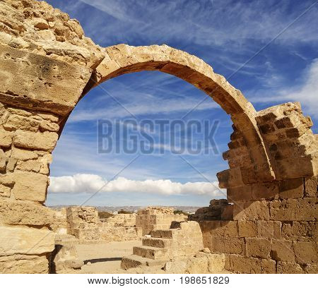 Ancient ruins of Kourion city near Pathos and Limassol, Cyprus. Santa Colones Castle ruins with blue sky. Travel outdoor background