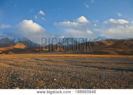 Views of the mountains and pastures of the river valley. The Tien Shan. The Issyk-Kul region Kyrgyzstan