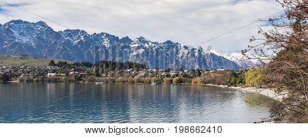 Queenstown South Island New Zealand looking over Lake Wakatipu with The Remarkables in the distance.