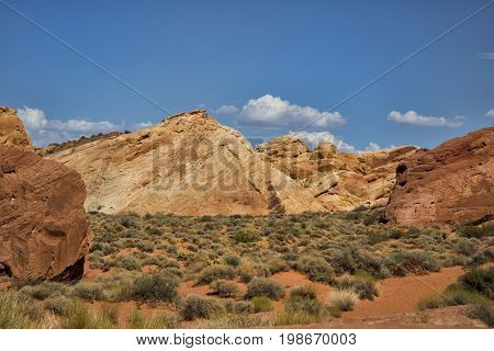 Landscape into Valley of fire in Nevada with mountains in background