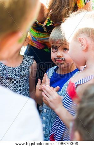 Alchevsk, Ukraine - July 27, 2017: Happy Children Play With Animators In Summer