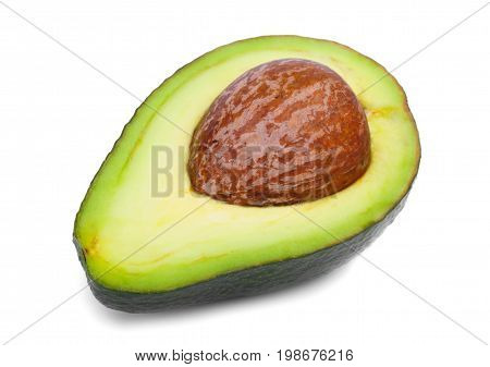 Macro picture of a single green avocado cut in half isolated over the white background. Nutritious and organic avocado for a spicy sauce. Tropical ripe avocado with hard core and juicy texture.