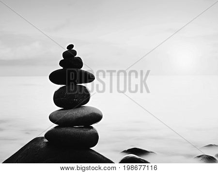 Rounded Colorful Stones Stand In The Form Of Pyramid Big Rounded Stone At Sea
