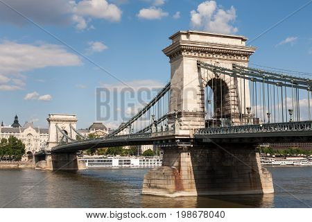 A view on the historic Szechenyi Chain Bridge and the Gresham Palace in the Hungarian capital Budapest Hungary