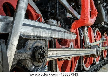 wheels and drive mechanisms of the old Soviet steam locomotive