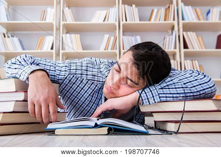 Young student studying with books