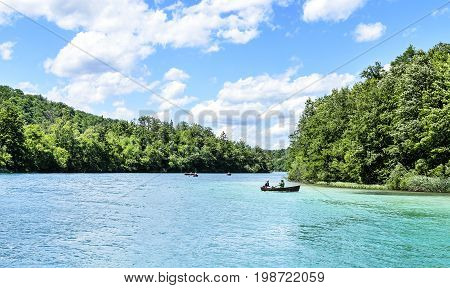 Boat on the Plitvice Lakes - JUNE 29: Boat on the Plitvice Lakes on a summer day. June 29, 2017. Croatia. Plitvice Lakes.