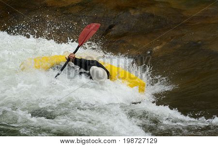 White water rapids kayaking at Clear Creek White Water Park in Golden, Colorado