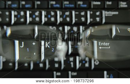 computer notebook keyboard through far sight eyeglasses