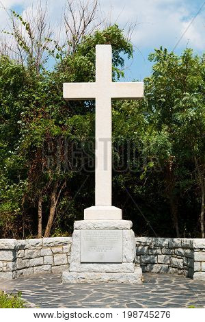 VIRGINIA BEACH, VIRGINIA - JULY 11, 2017:  A cross and memorial marking the first landing site of English colonists in 1607, who later established a settlement in Jamestown, Virginia.