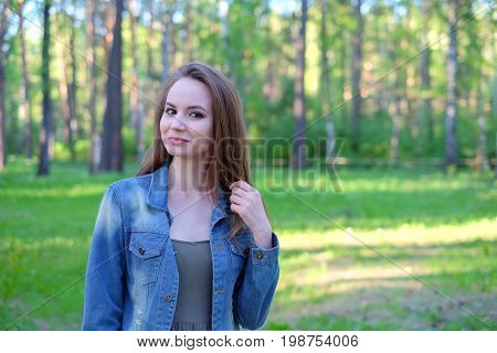 Beautiful woman in the park. Outdoor portrait