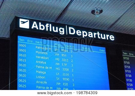 Zurich, Switzerland - June 11, 2017: Airport signboard Departure (Abflug) - at gate
