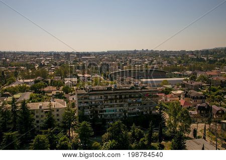 Evening aerial cityscape of Sukhum downtown, Abkhazia in summer