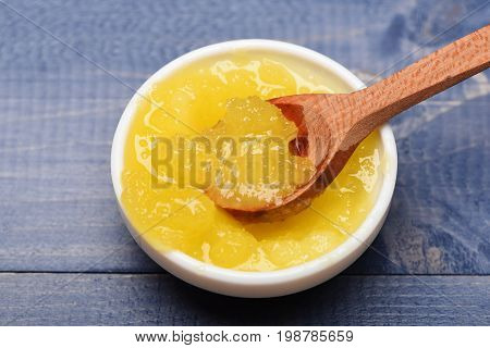 Spoonful Of Honey In White Cup, Top View