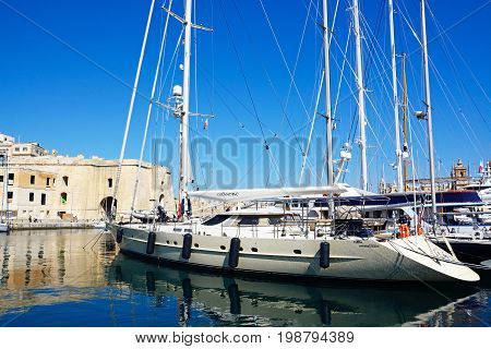 VITTORIOSA, MALTA - MARCH 31, 2017 - View of Vittoriosa and Senglea marina with Senglea waterfront buildings to the rear Vittoriosa (Birgu) Malta Europe, March 31, 2017.