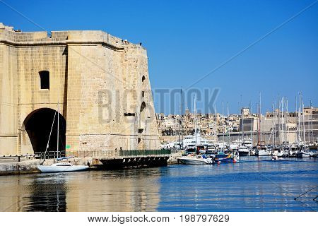 VITTORIOSA, MALTA - MARCH 31, 2017 - View of Senglea and Vittoriosa marina and waterfront buildings with views towards Valletta Vittoriosa (Birgu) Malta Europe, March 31, 2017.
