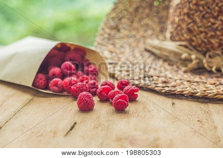 Summer Holiday, Vacation, Relaxation Concept. Raspberries, Straw Hat. Free Text Copy Space. Summer V