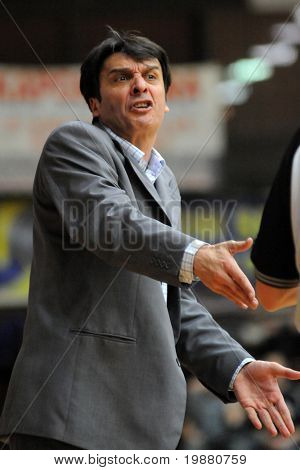 KAPOSVAR, HUNGARY - MARCH 6: Ivica Mavrenski (PecsÃ¢??s trainer) in action at a Hugarian Champonship basketball game Kaposvar vs. Pecsi VSK March 6, 2010 in Kaposvar, Hungary.