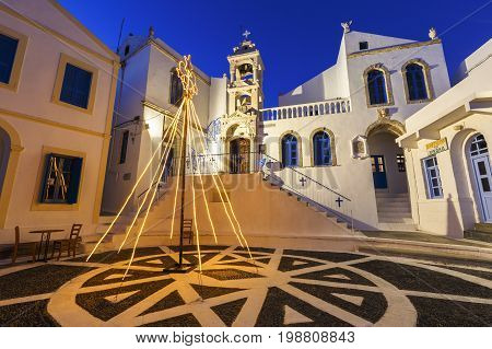 NIKIA, GREECE - DECEMBER 8, 2016: Architecture in the main square of Nikia village on Nisyros island in Dodecanese island group, Greece on December 08, 2016.