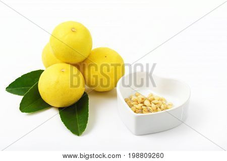 Fresh of lripe emon and leaf isolated on white background Lemon juice against cancer.